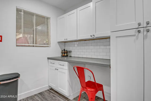 a utility room with closet a washer and dryer