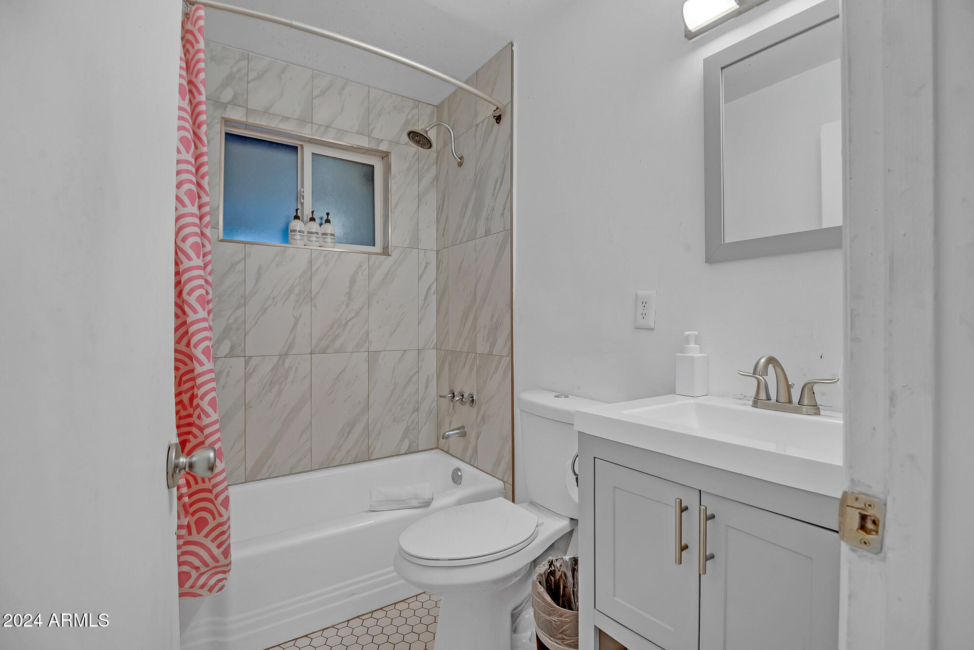 7832 East Heatherbrae Avenue, Unit C Scottsdale, AZ 85251 - Photo 28 of 48 a bathroom with a sink toilet vanity and tub