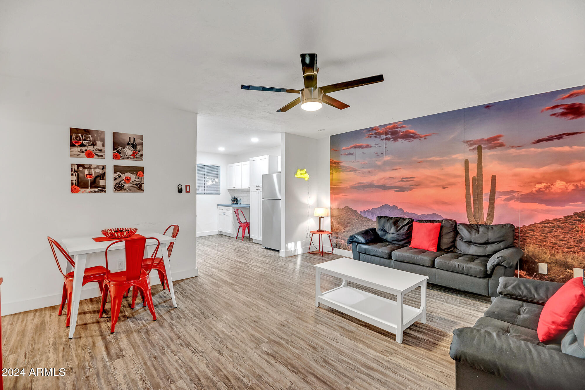 7832 East Heatherbrae Avenue, Unit C Scottsdale, AZ 85251 - Photo 5 of 48 a living room with furniture and a large window