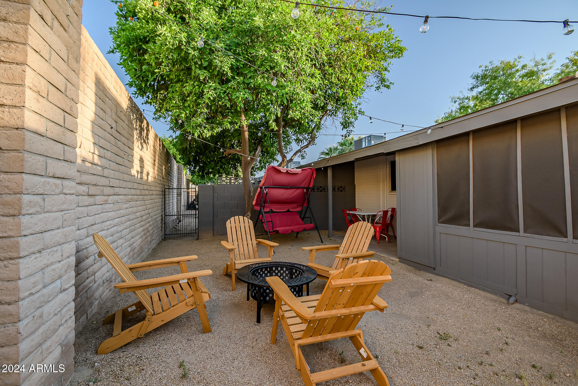 7832 East Heatherbrae Avenue, Unit C Scottsdale, AZ 85251 - Photo 6 of 48 a view of backyard with outdoor seating and plants