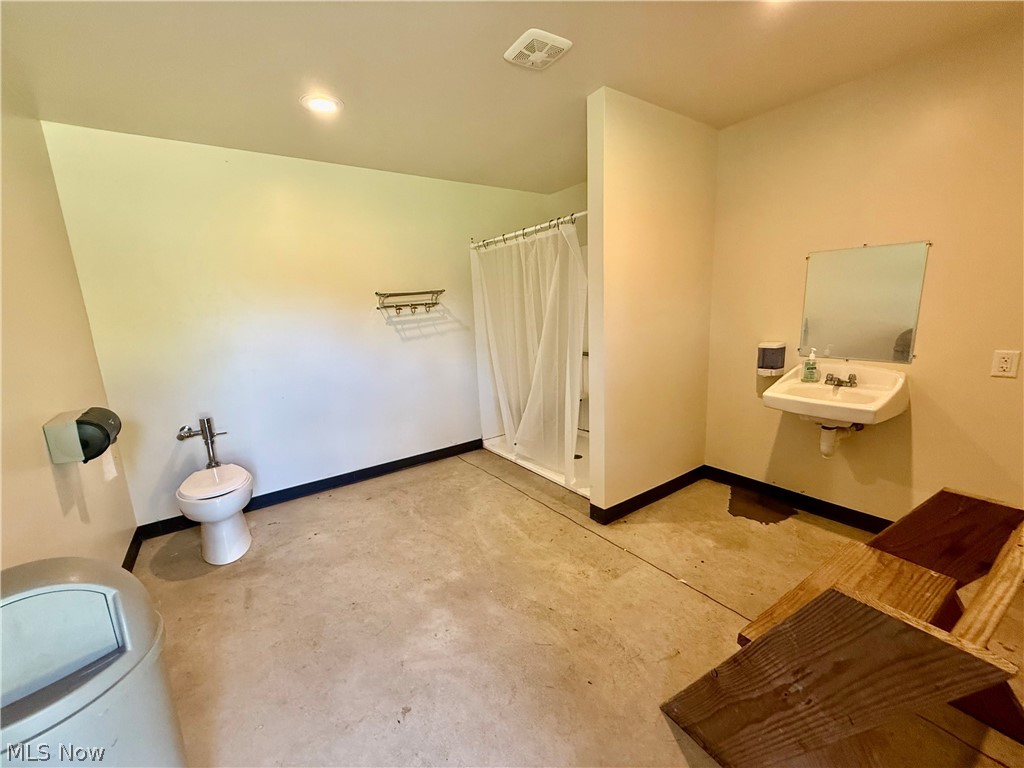 79601 Adams Road Freeport, OH 43973 - Photo 14 of 49 Handicapped accessible bathroom in log bathhouse