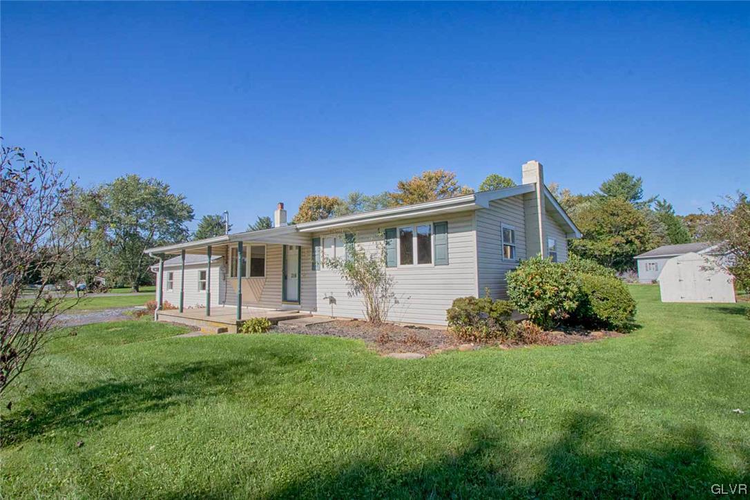 a house view with a garden space