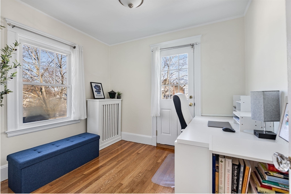 424 Brook Road Milton, MA 02186 - Photo 19 of 41 a view of a workspace with furniture and a window
