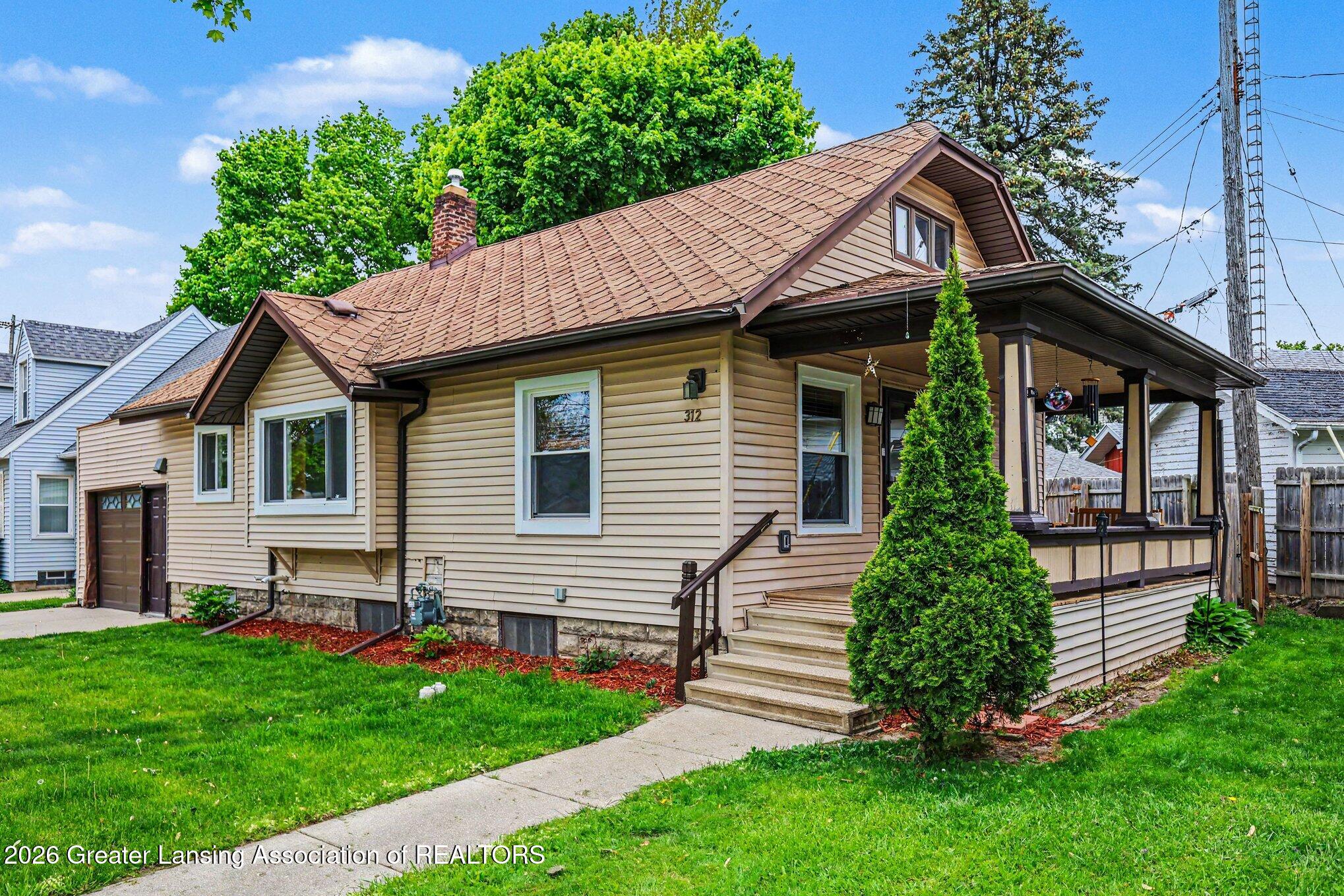 312 West Rockford Road Lansing, MI 48910 - Photo 4 of 26 004_file_9634