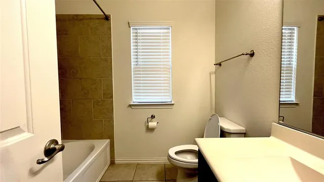 a close view of a bathtub in a bathroom