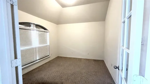 a view of a room with a window