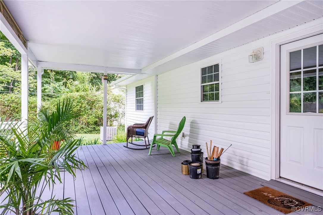 184 Fox Road Gum Spring, VA 23065 - Photo 27 of 27 a view of a deck with furniture and garden