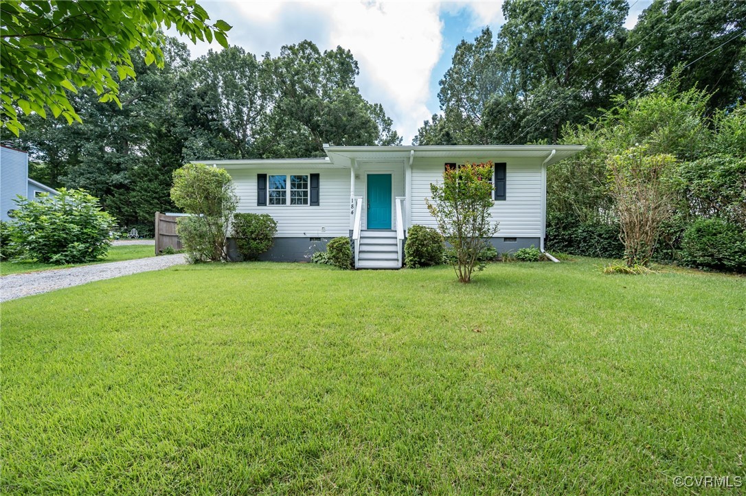 184 Fox Road Gum Spring, VA 23065 - Photo 3 of 27 front view of a house with a yard and trees