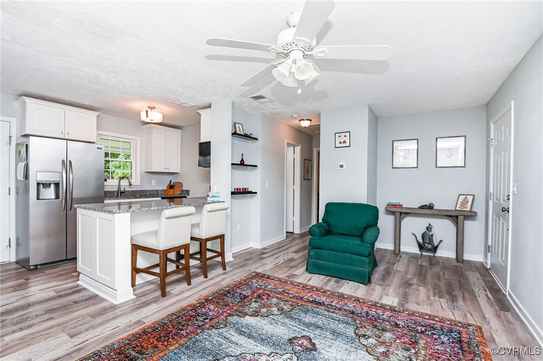 184 Fox Road Gum Spring, VA 23065 - Photo 10 of 27 a living room with furniture and a kitchen view