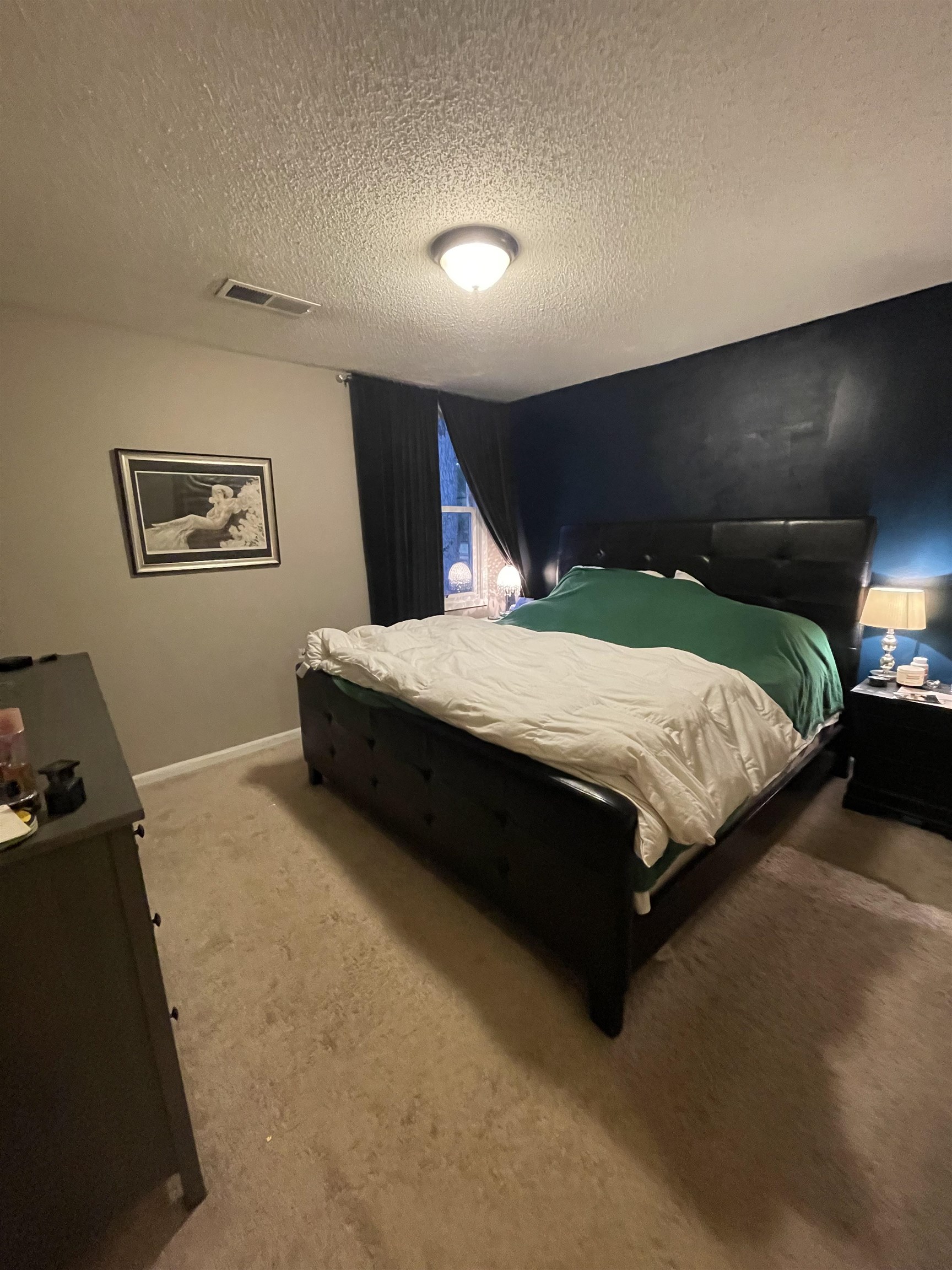 8469 Rothchild Road, Unit 33 Germantown, TN 38139 - Photo 18 of 25 Bedroom featuring carpet and a textured ceiling