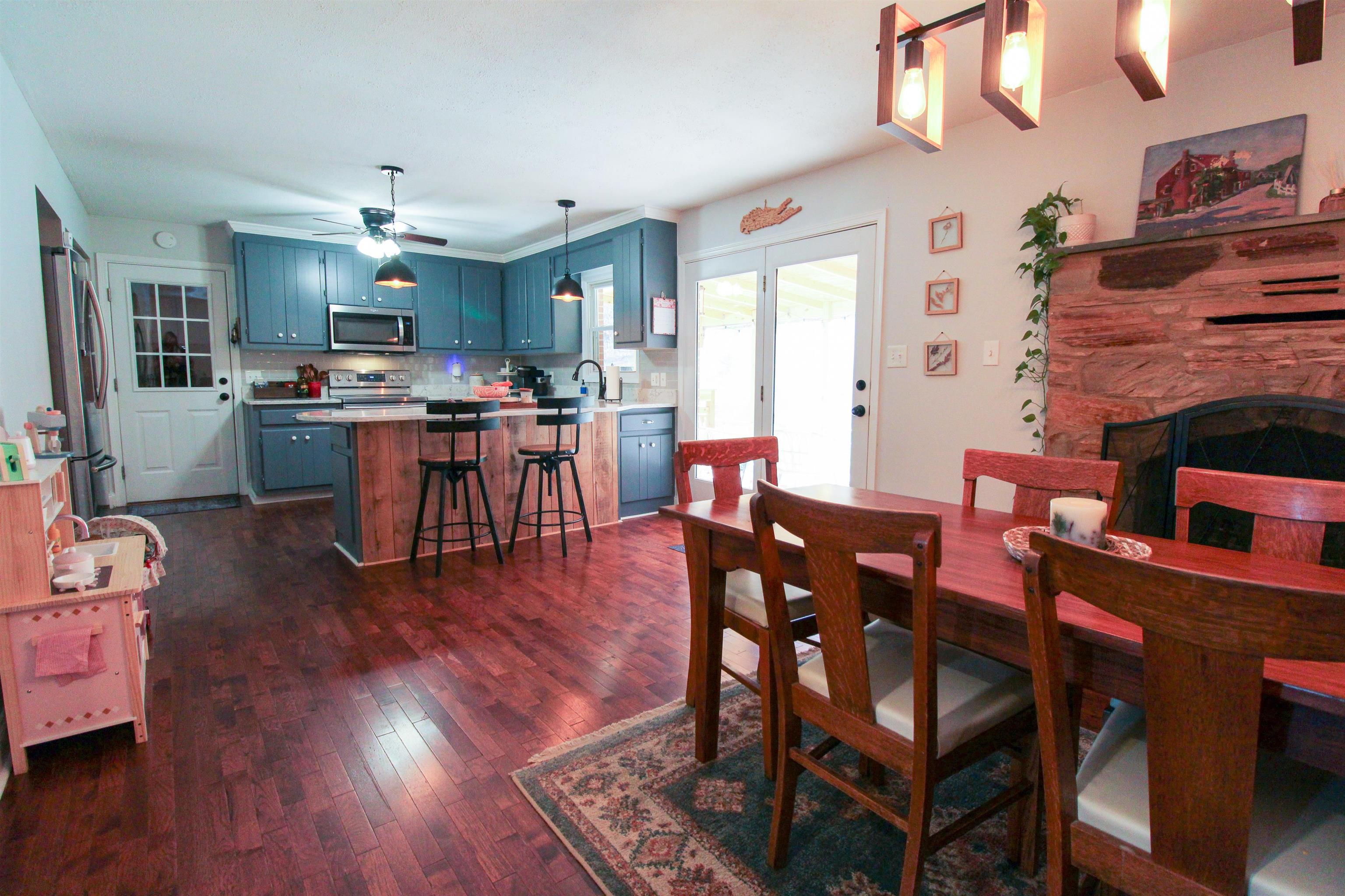169 Calf Mountain Road Waynesboro, VA 22980 - Photo 14 of 74 a view of a dining room with furniture and wooden floor