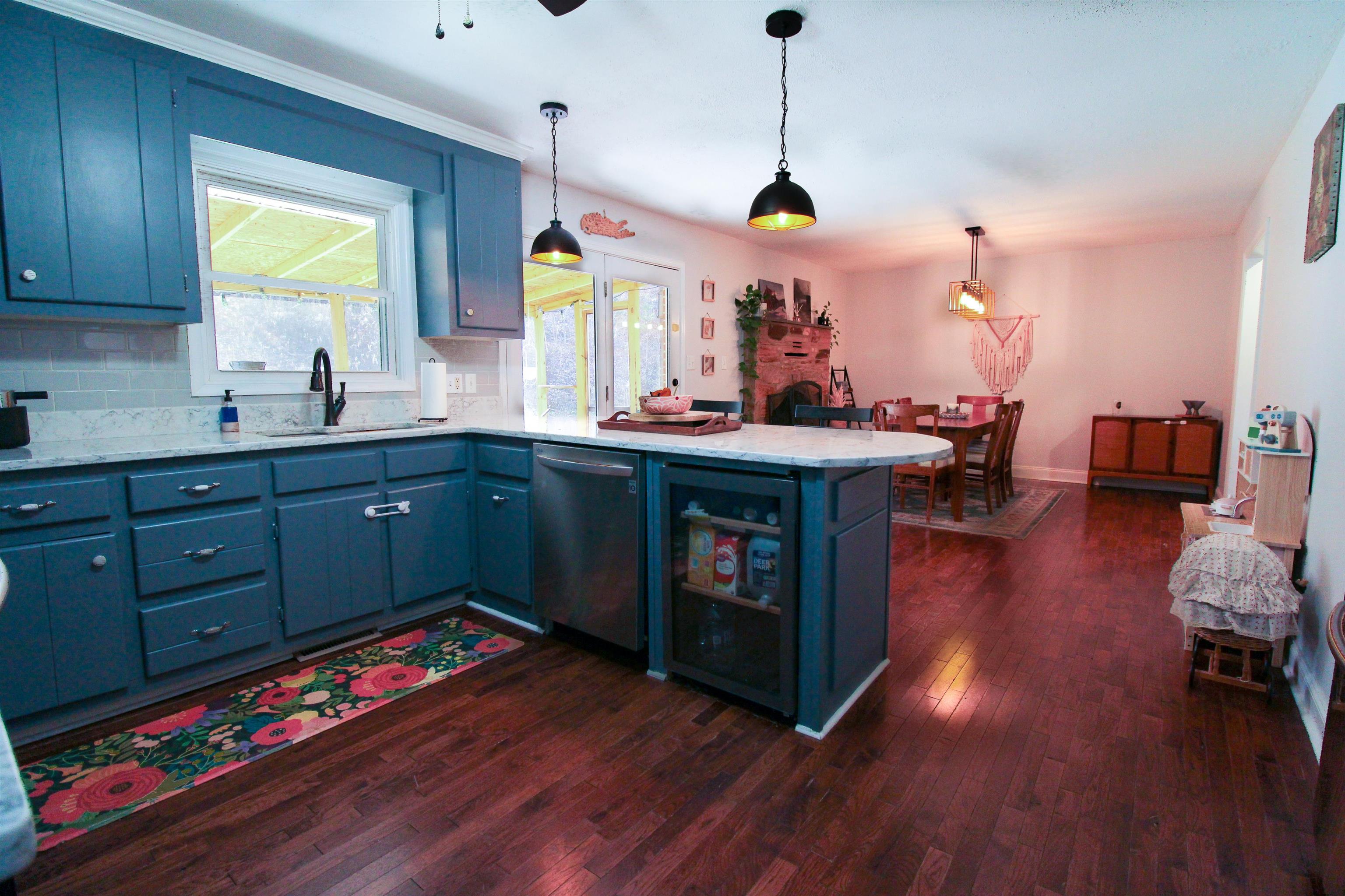 169 Calf Mountain Road Waynesboro, VA 22980 - Photo 19 of 74 a kitchen with sink cabinets and wooden floor