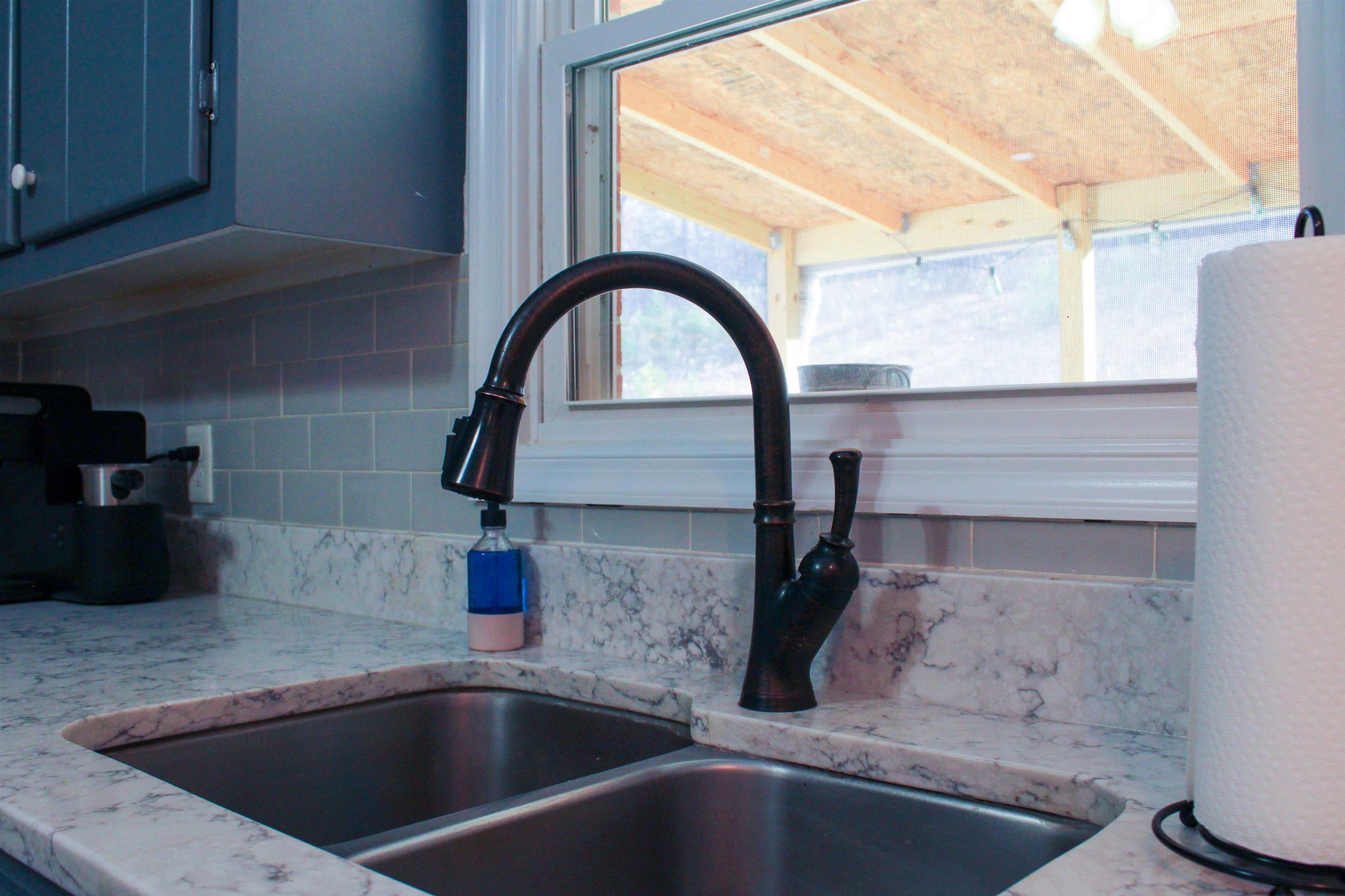 169 Calf Mountain Road Waynesboro, VA 22980 - Photo 28 of 74 a close view of sink and tap