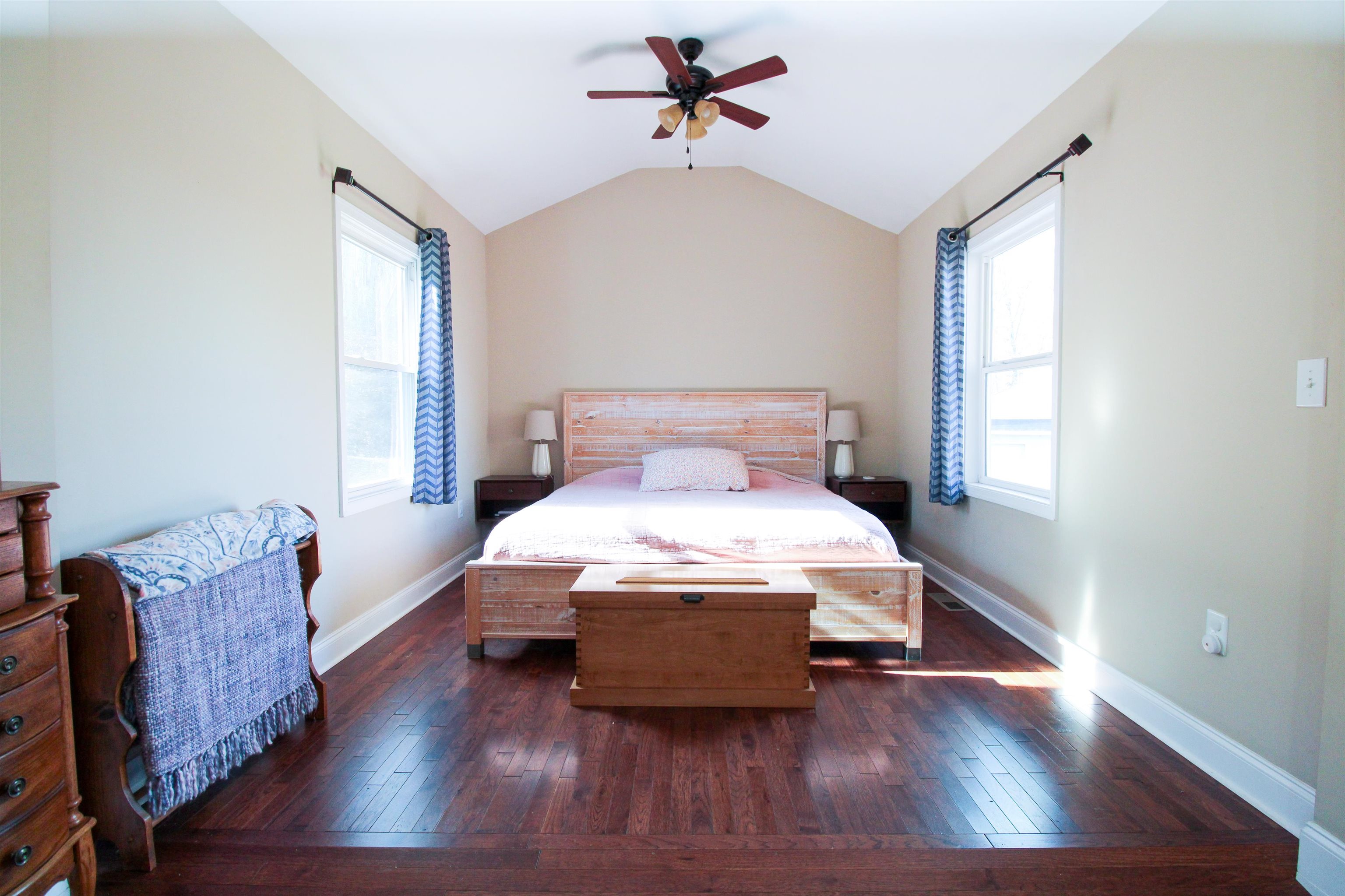 169 Calf Mountain Road Waynesboro, VA 22980 - Photo 41 of 74 a bedroom with a bed a window and lamps