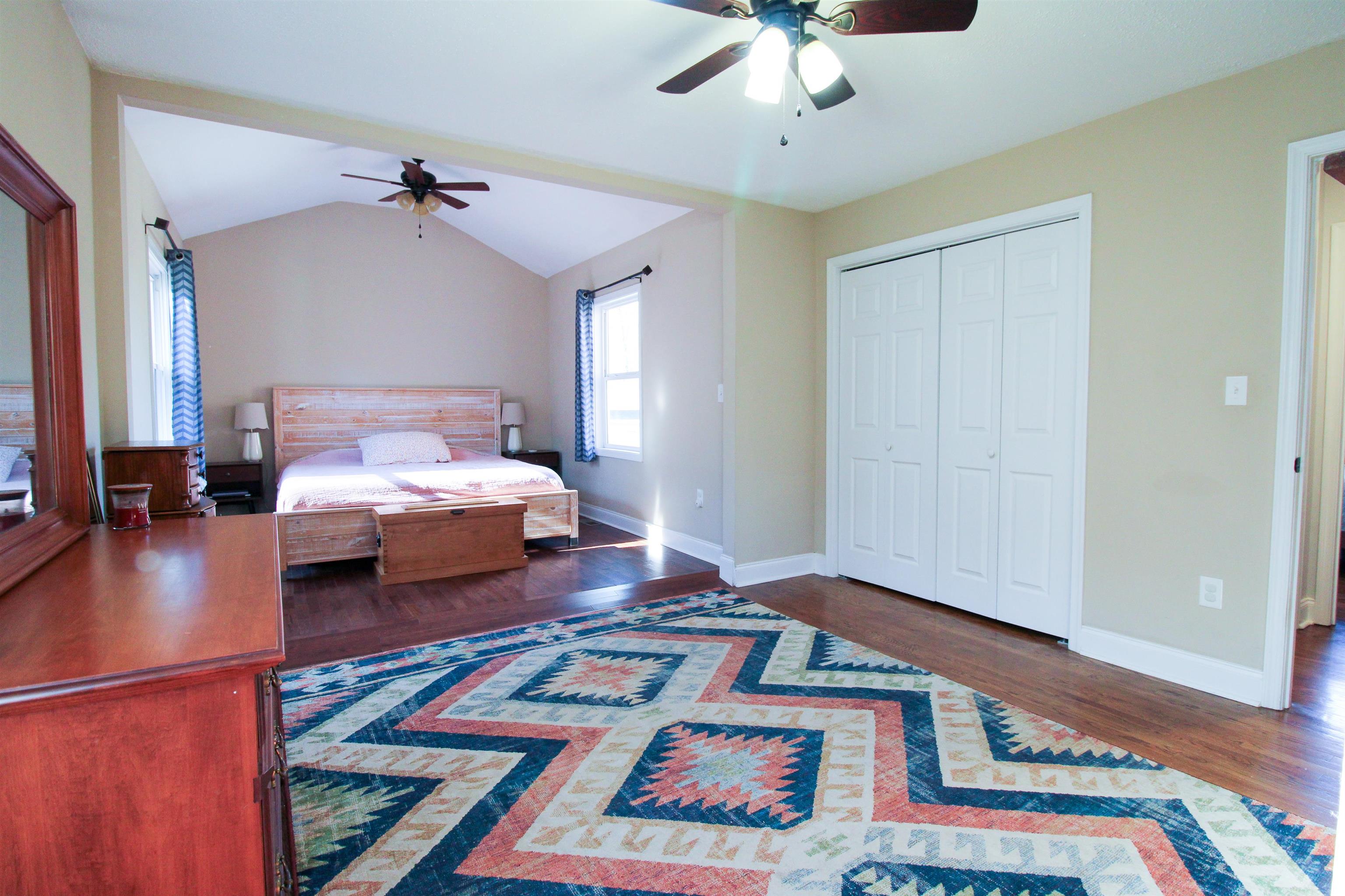 169 Calf Mountain Road Waynesboro, VA 22980 - Photo 42 of 74 a bedroom with furniture and a wooden floor