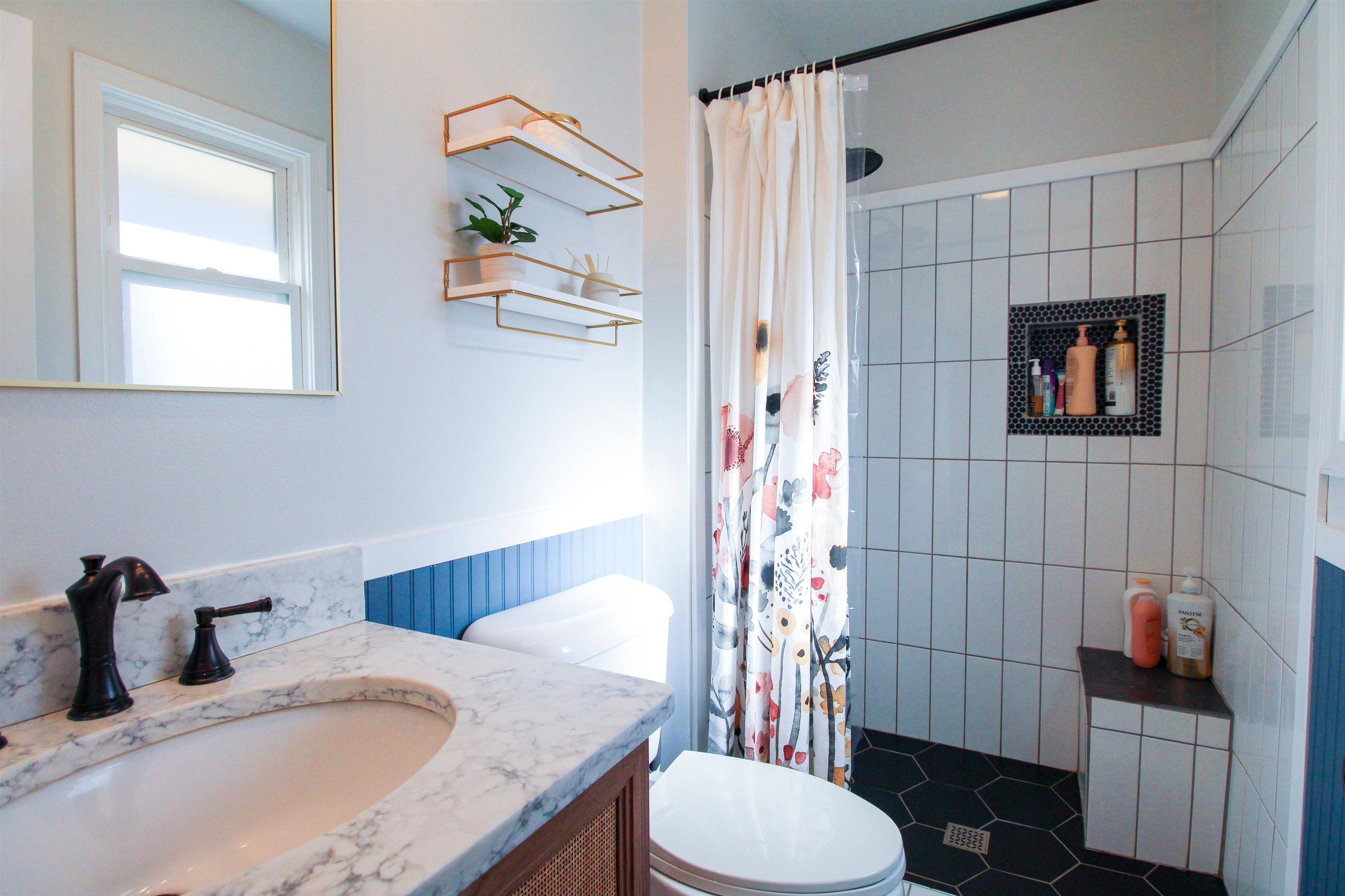 169 Calf Mountain Road Waynesboro, VA 22980 - Photo 44 of 74 a bathroom with a granite countertop toilet sink and mirror