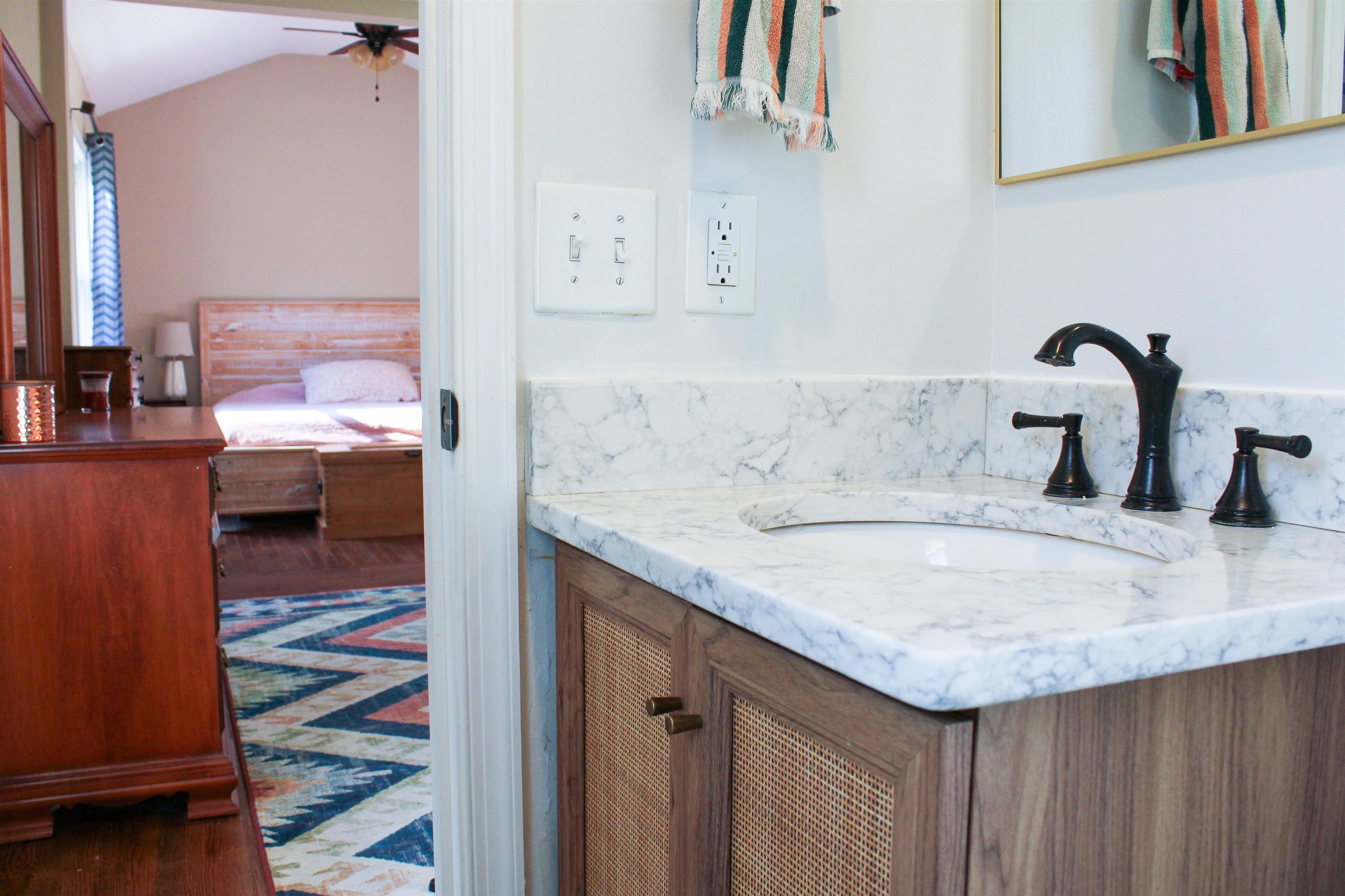 169 Calf Mountain Road Waynesboro, VA 22980 - Photo 45 of 74 a bathroom with a granite countertop sink and a mirror