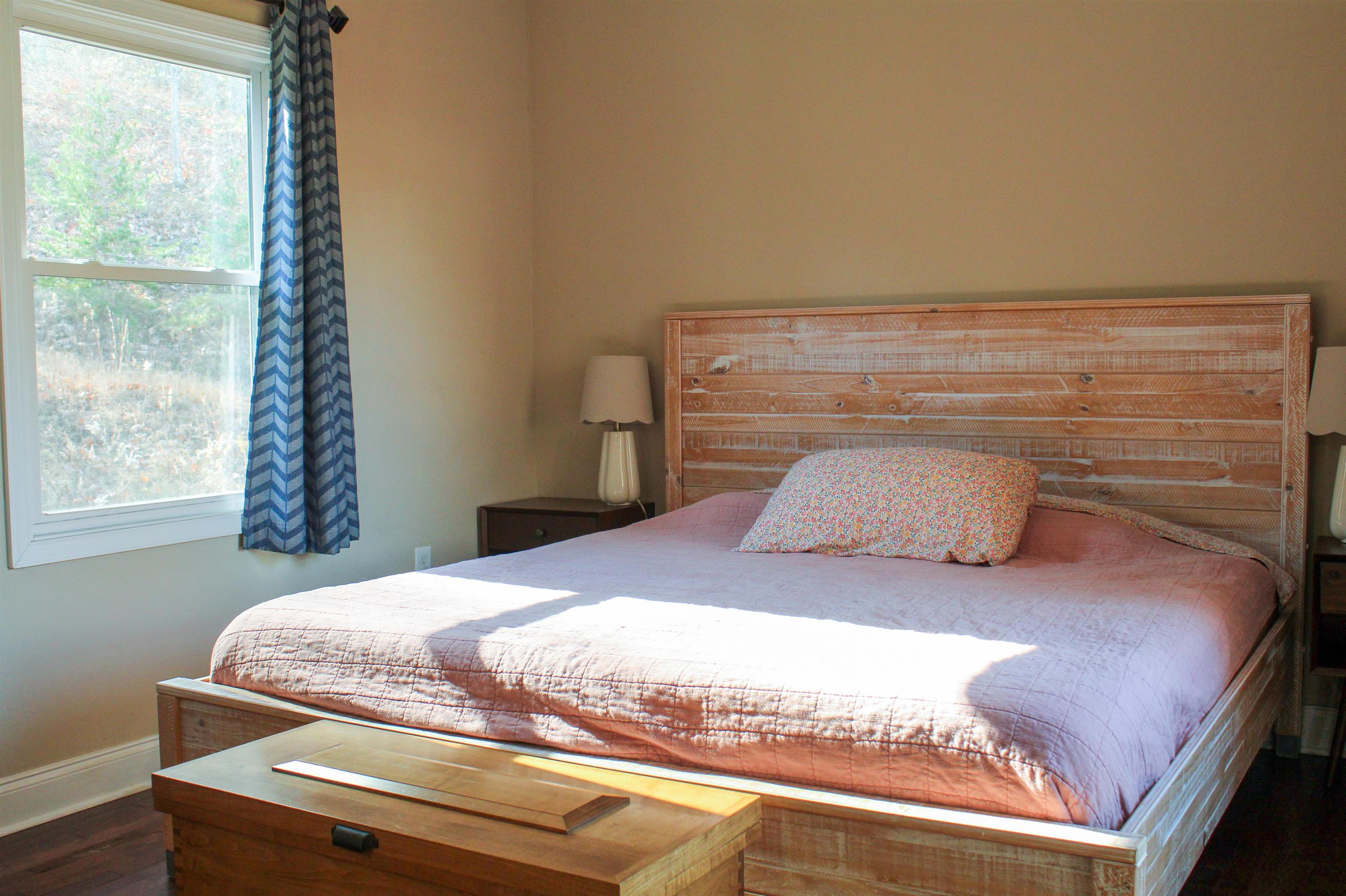 169 Calf Mountain Road Waynesboro, VA 22980 - Photo 49 of 74 a bedroom with a bed and a window