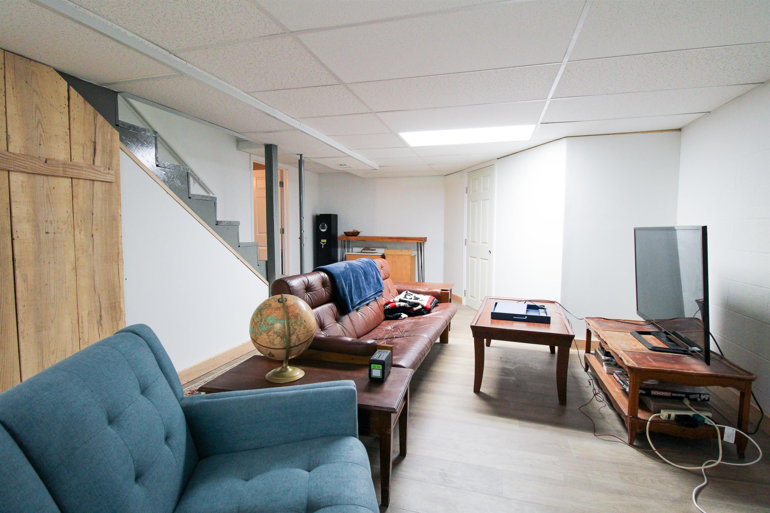 169 Calf Mountain Road Waynesboro, VA 22980 - Photo 61 of 74 a living room with furniture and a window
