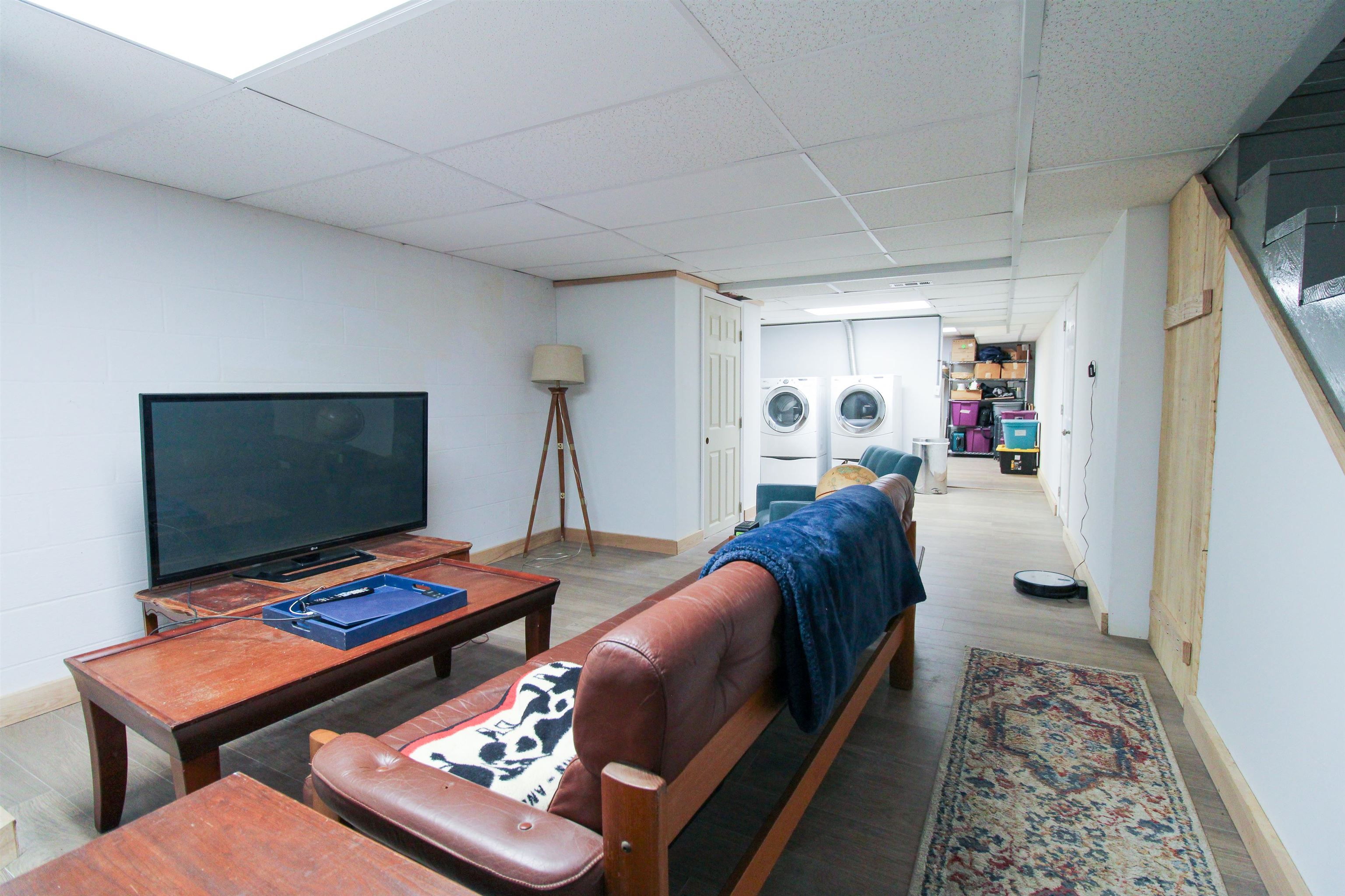 169 Calf Mountain Road Waynesboro, VA 22980 - Photo 63 of 74 a bedroom with furniture and a flat screen tv