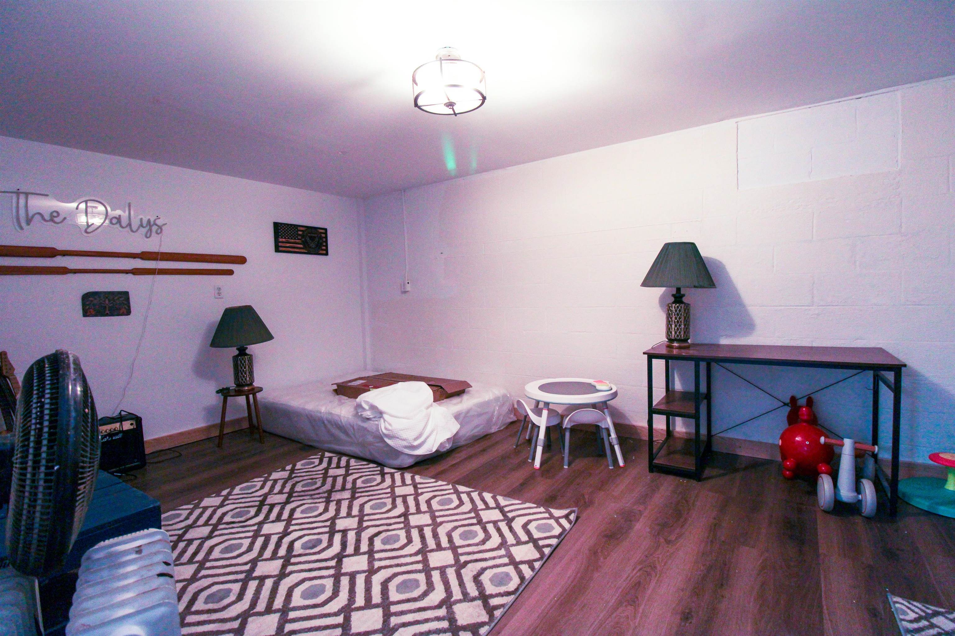 169 Calf Mountain Road Waynesboro, VA 22980 - Photo 69 of 74 a living room with furniture and wooden floor