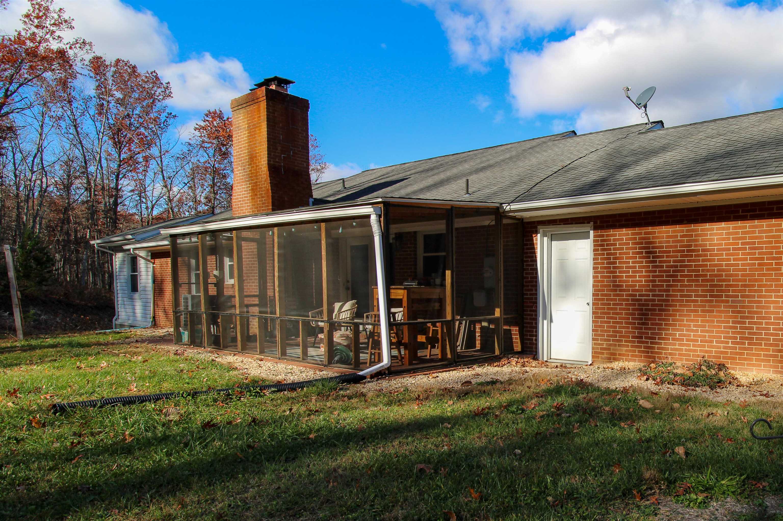 169 Calf Mountain Road Waynesboro, VA 22980 - Photo 71 of 74 a view of a house with backyard porch and garden