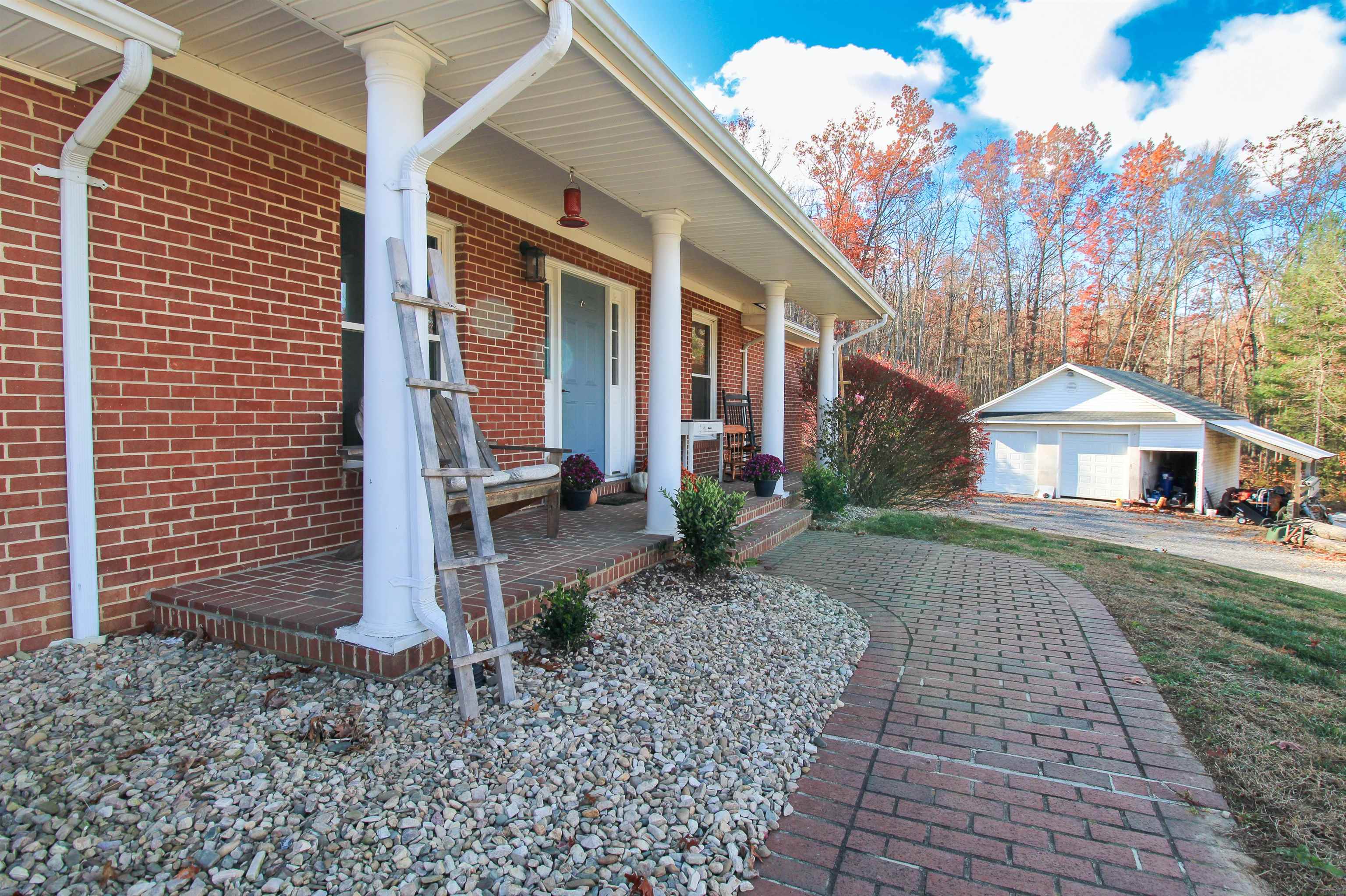 169 Calf Mountain Road Waynesboro, VA 22980 - Photo 9 of 74 a front view of a house with garden