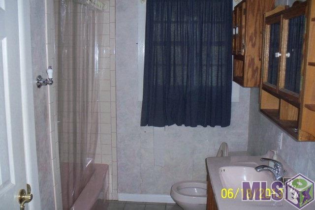 416 St Louis Street Raceland, LA 70394 - Photo 10 of 14 Bathroom 1