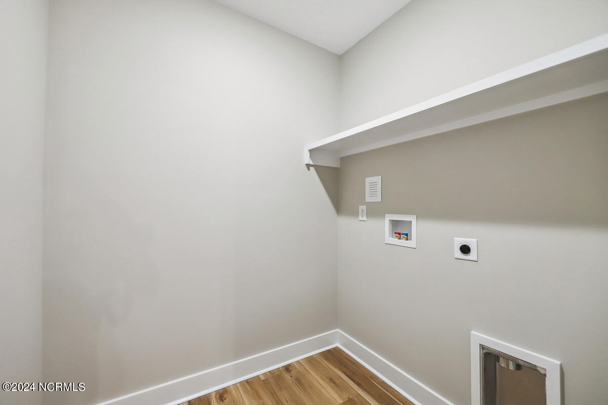 702 Boundary Loop Road Northwest Calabash, NC 28467 - Photo 16 of 23 702 laundry room