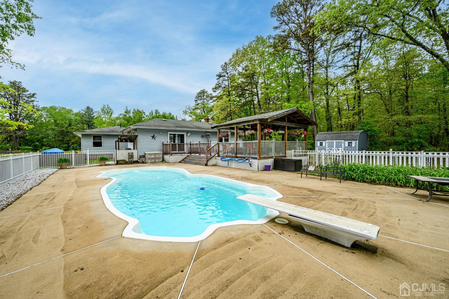 439 Cassville Road Jackson, NJ 08527 - Photo 33 of 45 a house view with a garden space