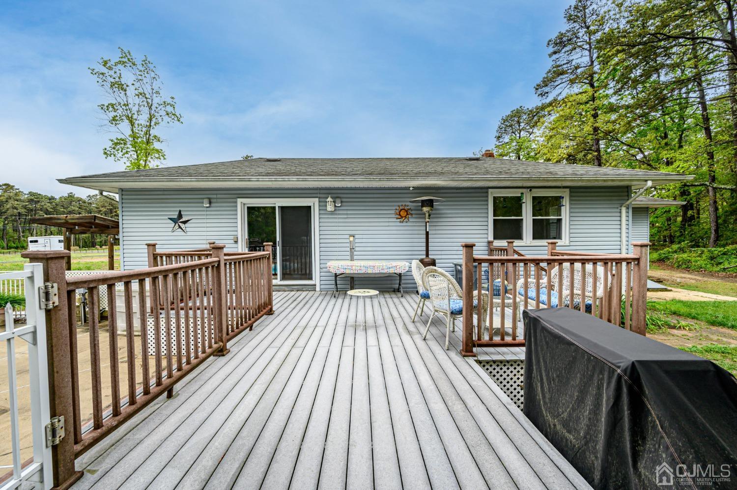439 Cassville Road Jackson, NJ 08527 - Photo 41 of 45 a view of a house with wooden deck