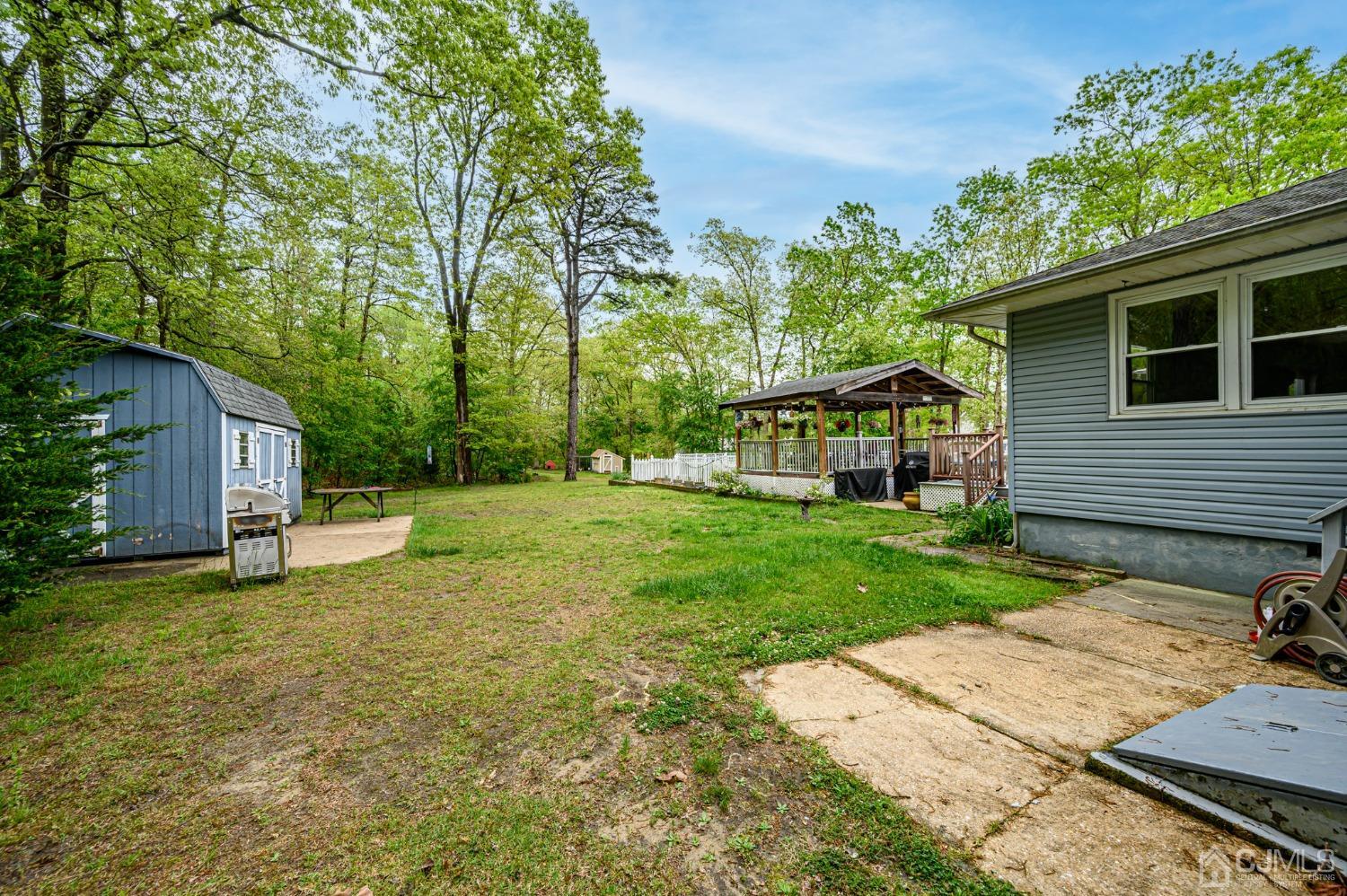 439 Cassville Road Jackson, NJ 08527 - Photo 42 of 45 a view of a house with backyard and sitting area