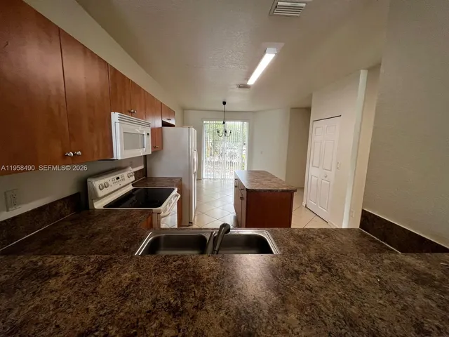 $1,950 | 1909 Hibiscus Lane, Unit 1909, Riviera Beach, FL 33404