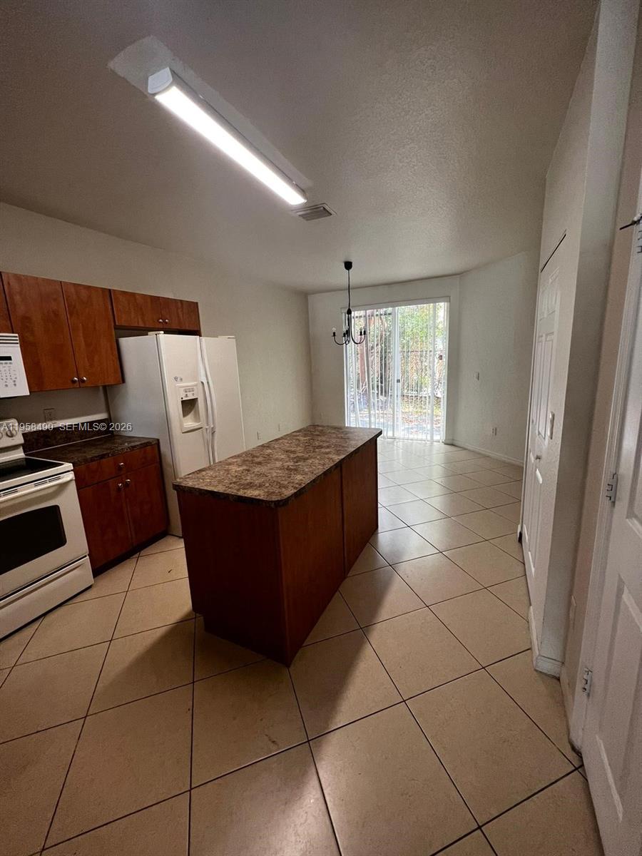 1909 Hibiscus Lane, Unit 1909 Riviera Beach, FL 33404 - Photo 2 of 20