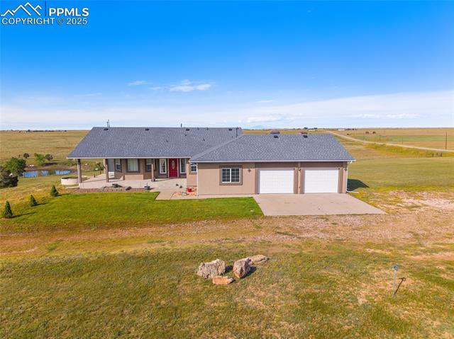 8484 Berridge Road Calhan, CO 80808 - Photo 6 of 50 Sunrises to the east for morning coffee. Check out your private pond.