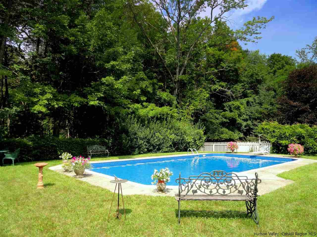 895 Buck Road Stone Ridge, NY 12484 - Photo 3 of 22 a view of swimming pool with a garden