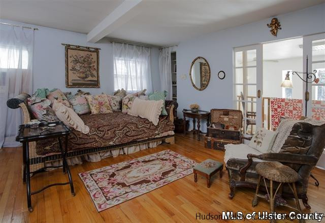 895 Buck Road Stone Ridge, NY 12484 - Photo 9 of 22 a living room with furniture rug and window