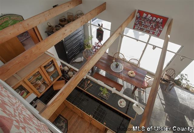 895 Buck Road Stone Ridge, NY 12484 - Photo 10 of 22 a view of a stove top oven with wooden floor