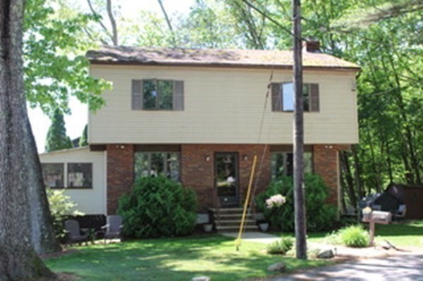 30 Birchmeadow Road Amesbury, MA 01913 - Photo 2 of 26 a front view of a house with garden