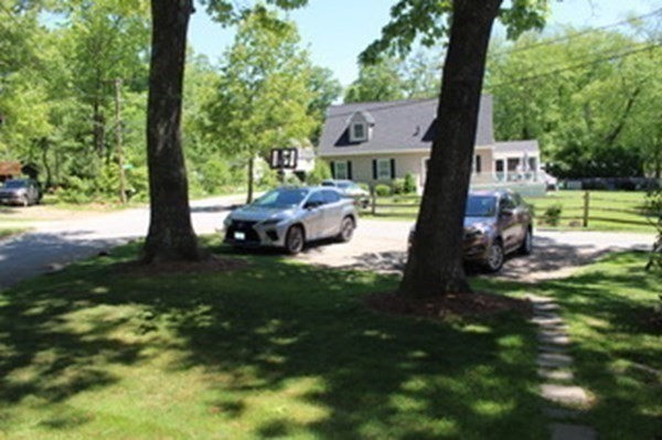 30 Birchmeadow Road Amesbury, MA 01913 - Photo 23 of 26 a front view of a house with garden