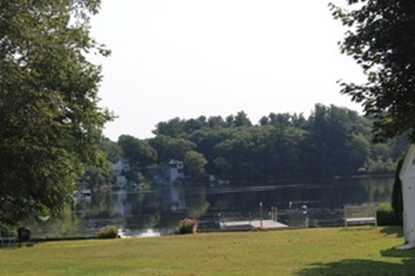 30 Birchmeadow Road Amesbury, MA 01913 - Photo 26 of 26 a swimming pool with trees in the background