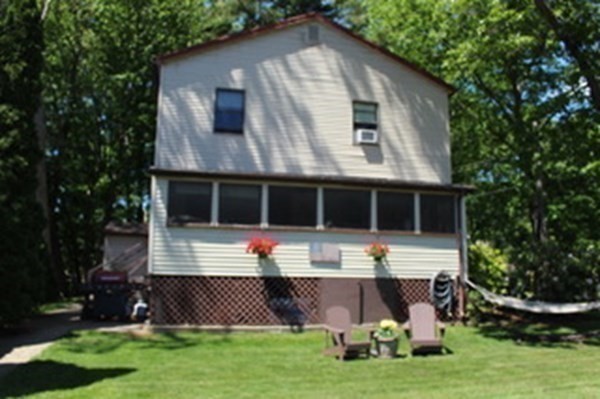 30 Birchmeadow Road Amesbury, MA 01913 - Photo 3 of 26 a front view of a house with a yard