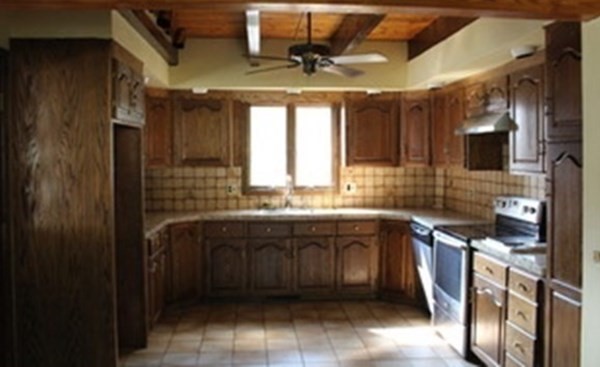 30 Birchmeadow Road Amesbury, MA 01913 - Photo 8 of 26 a kitchen with a sink and cabinets