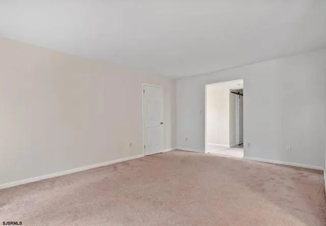 a bathroom with a sink toilet vanity and tub