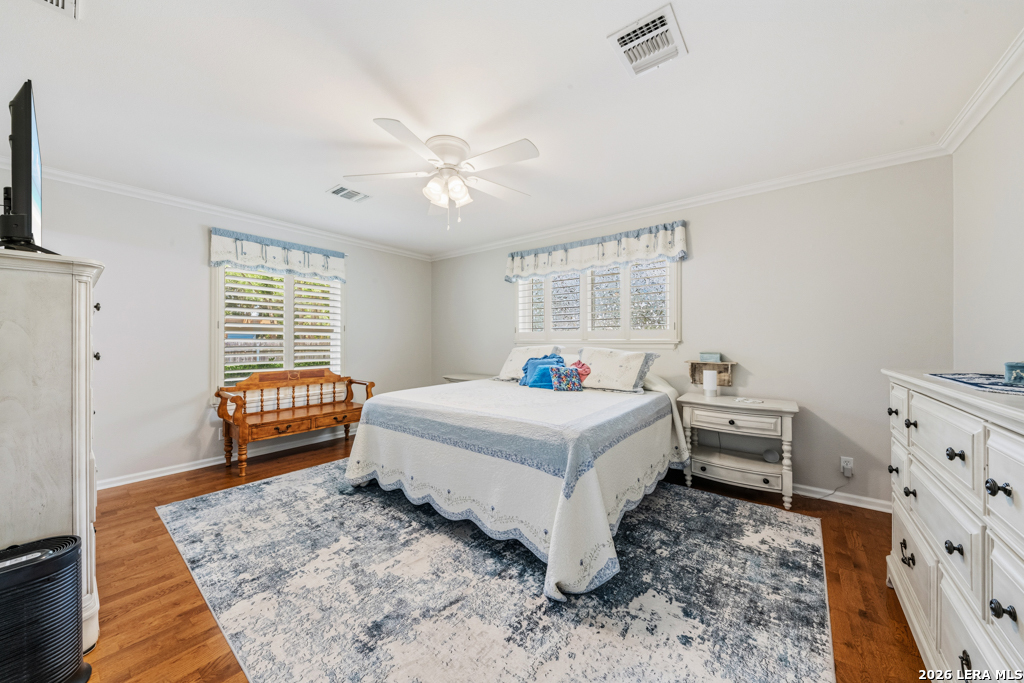 6022 Winding Ridge Drive Windcrest, TX 78239 - Photo 19 of 31 a bedroom with a bed and a window in it