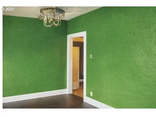 a view of an empty room and window