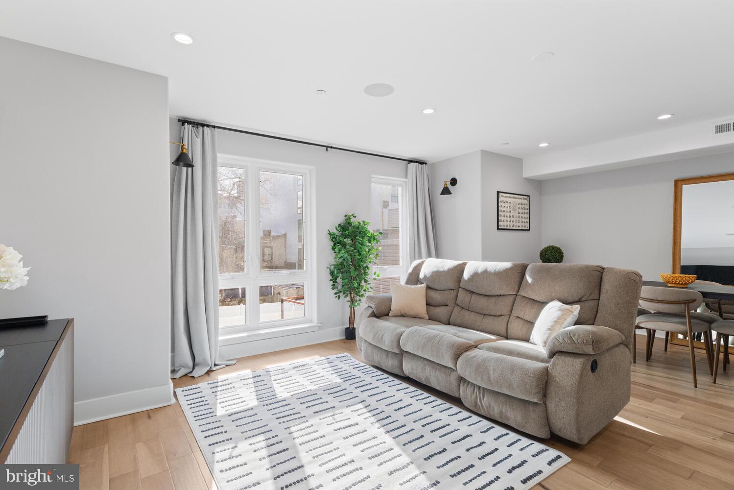 1224 North 26th Street, Unit F1 Philadelphia, PA 19121 - Photo 12 of 25 Bright and airy modern living space.