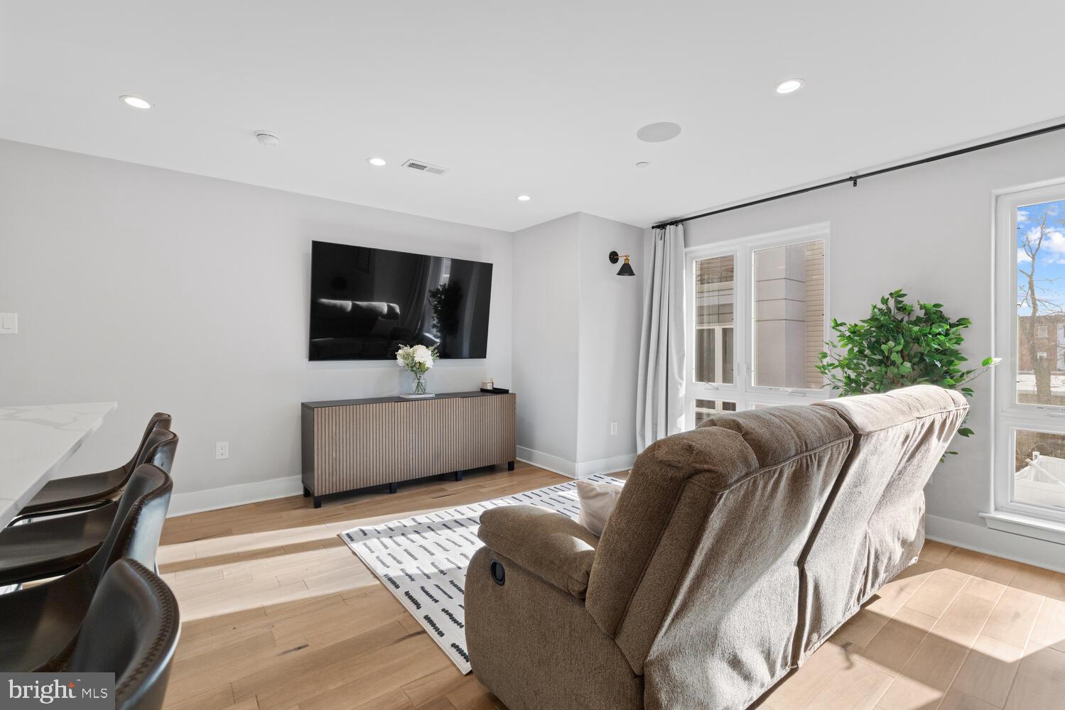 1224 North 26th Street, Unit F1 Philadelphia, PA 19121 - Photo 13 of 25 Modern living space with natural light.