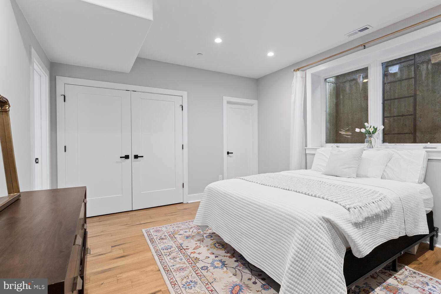 1224 North 26th Street, Unit F1 Philadelphia, PA 19121 - Photo 20 of 25 Serene bedroom with natural light and style.