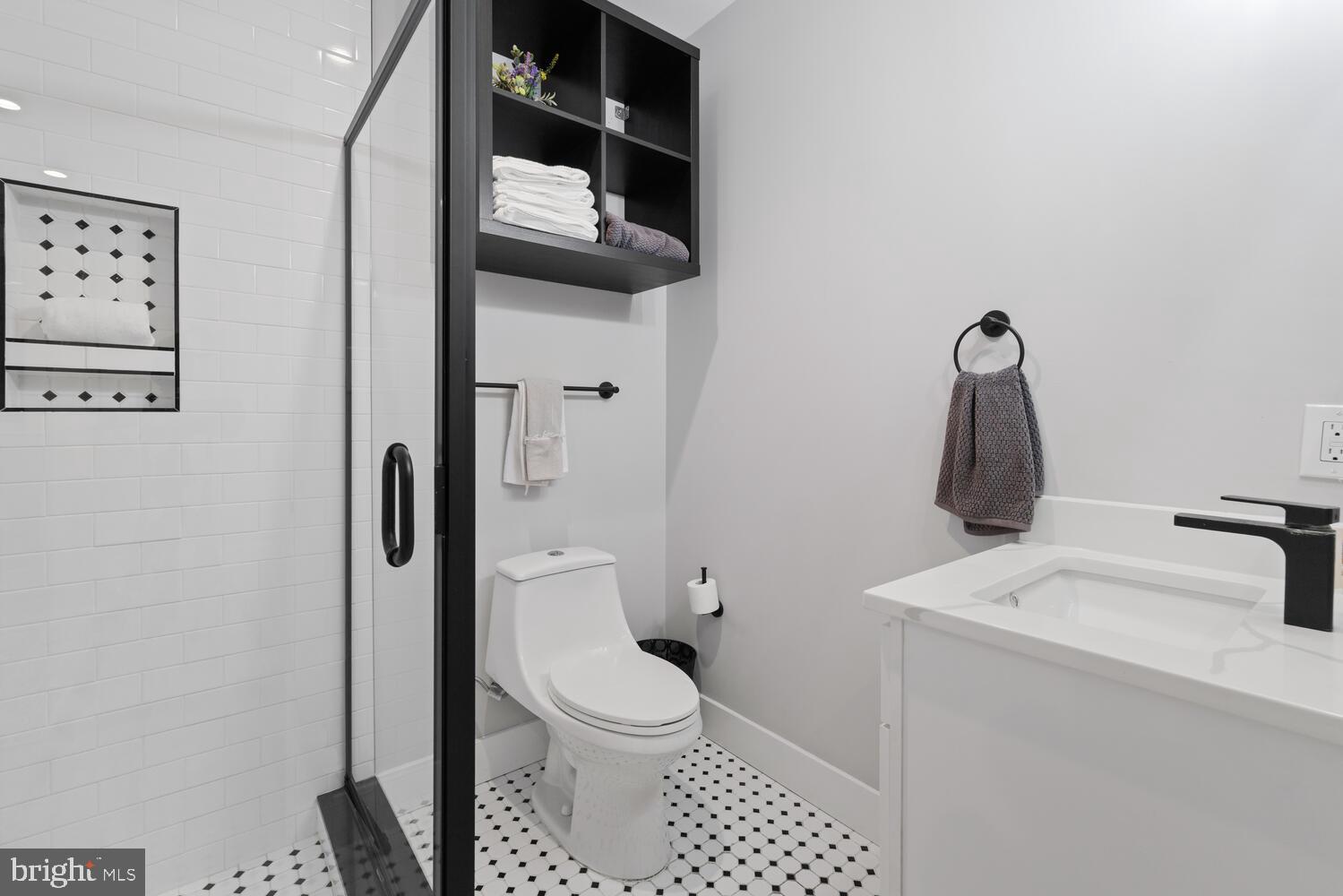 1224 North 26th Street, Unit F1 Philadelphia, PA 19121 - Photo 23 of 25 Sleek modern bathroom with stylish accents.